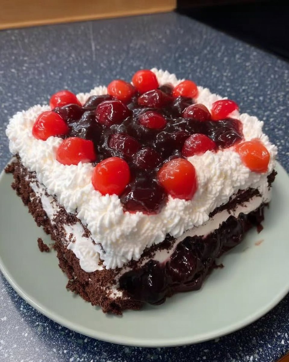 Ingredients for black forest cake including cocoa powder cherries and eggs