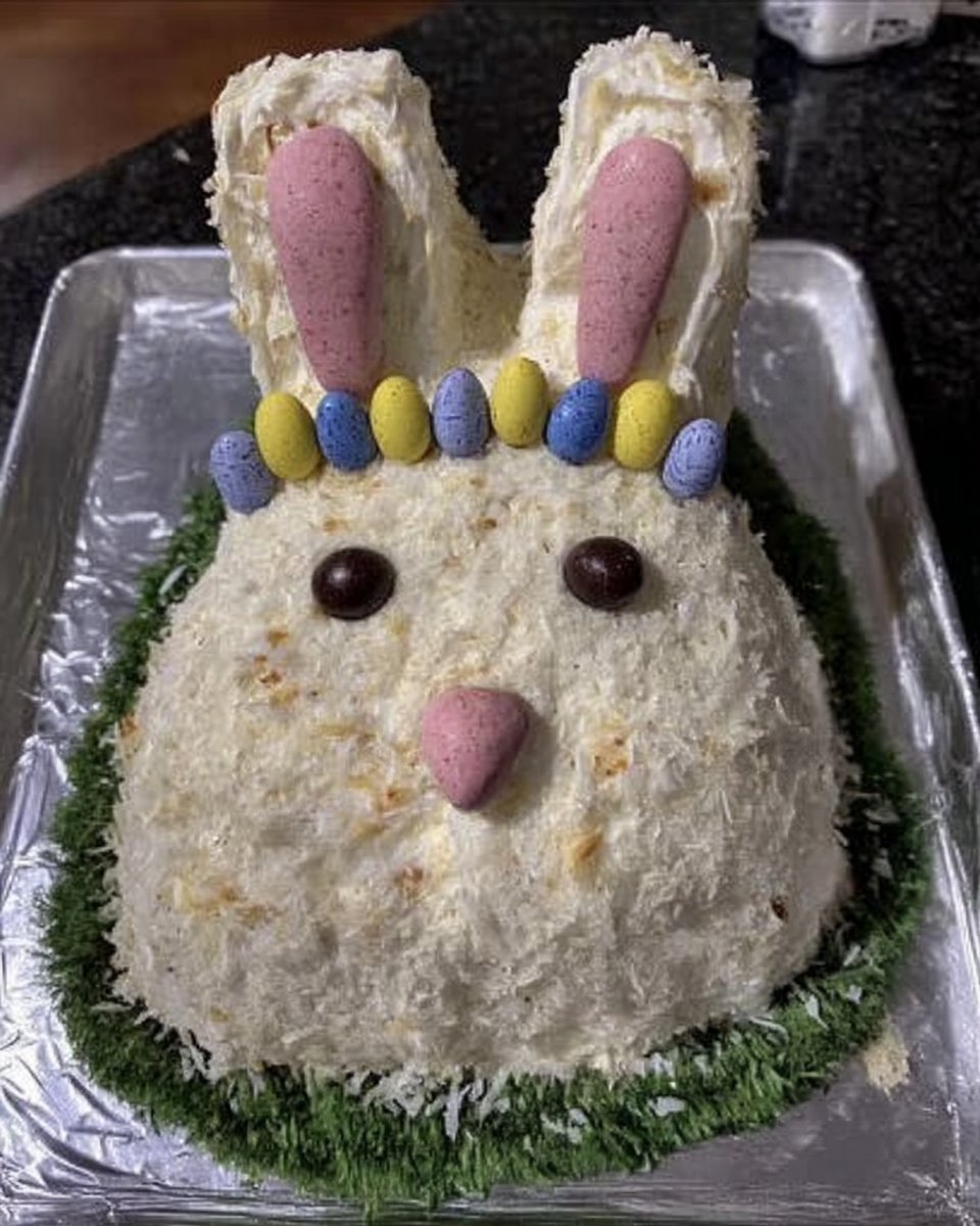 Speckled Easter Egg Cake 13 Using a toothbrush to flick cocoa speckles onto a blue cake
