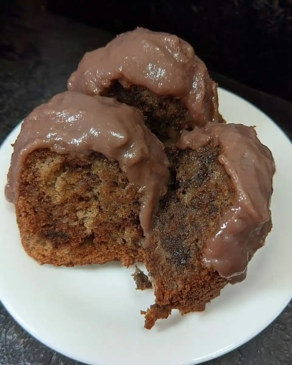 Chocolate Fudge Cake 14 Elegant serving of chocolate fudge cake with fork and napkin