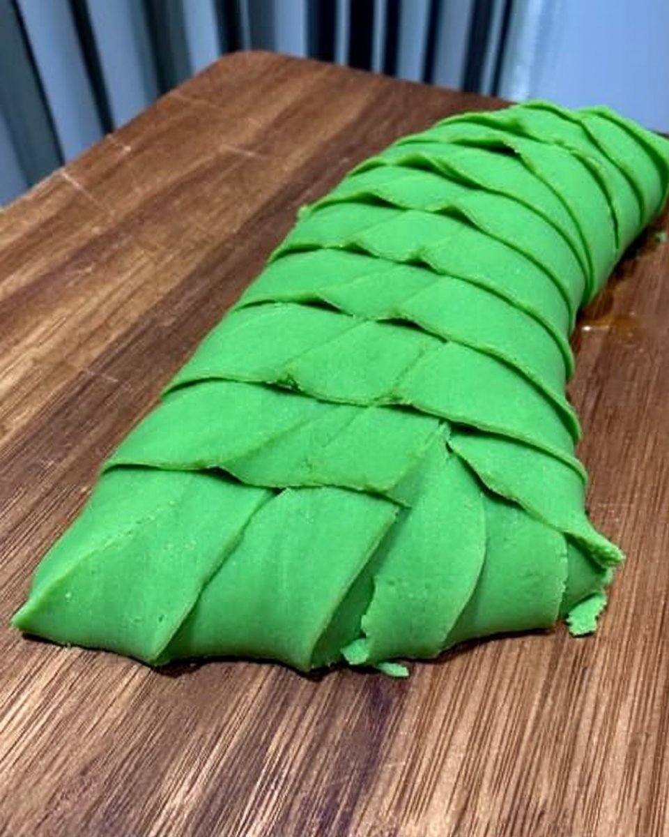 Jungle Theme Cake 13 Folding dry ingredients into fluffy egg mixture