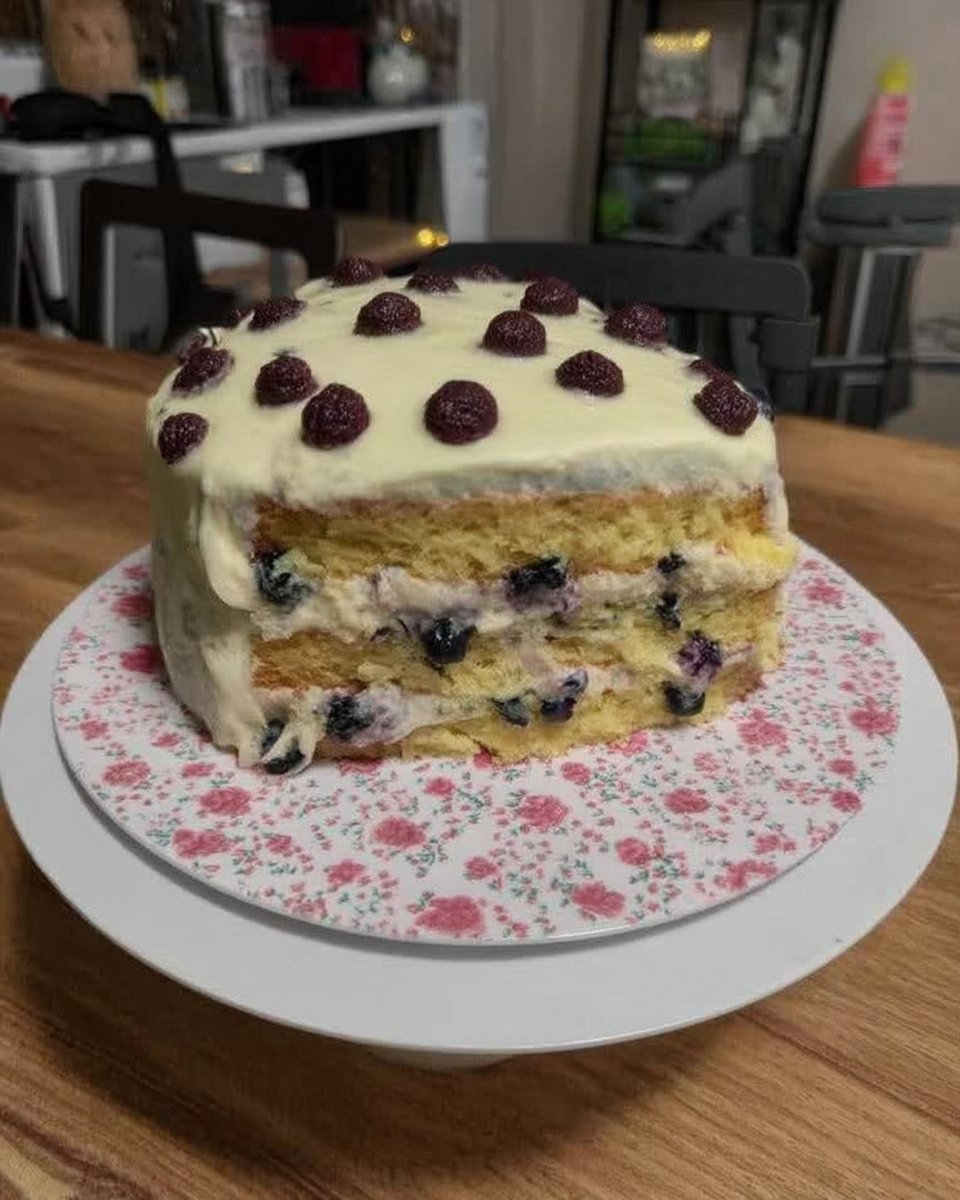 Lemon Blueberry Cake 12 Bowl of fresh blueberries and lemon zest on a wooden table