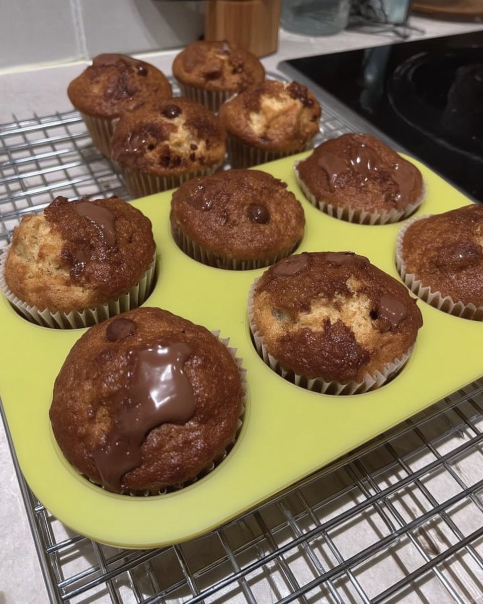 Ingredients for mini cake recipe including butter oil eggs and flour on a countertop