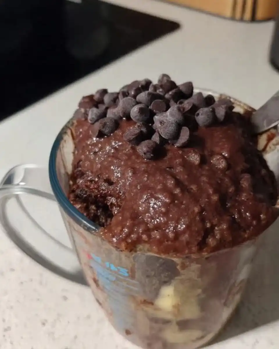 Bowls of roasted hazelnuts cocoa powder and Nutella ready for baking