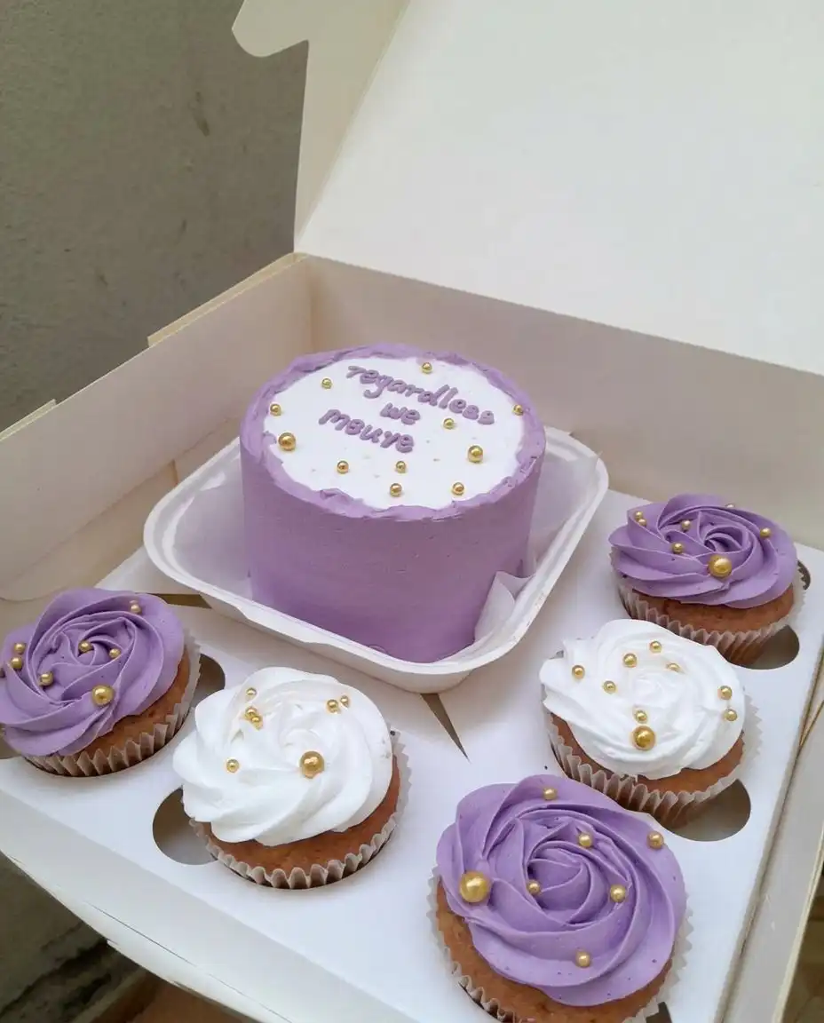 A bento cake with small piped flowers on top