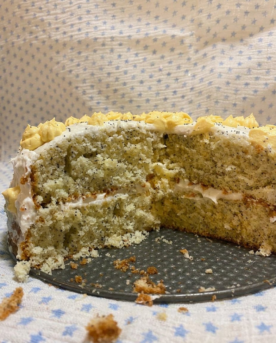 Hands rubbing lemon zest into granulated sugar in a ceramic bowl