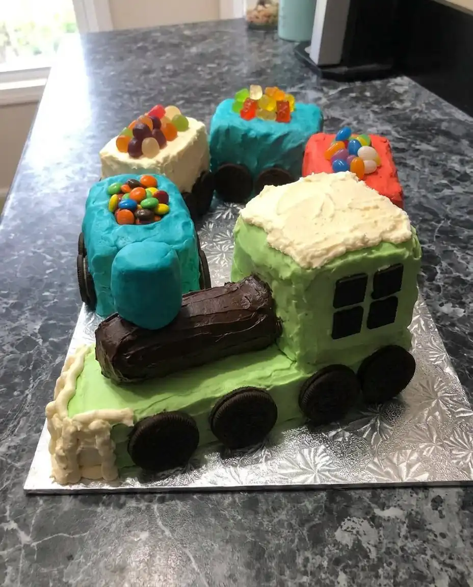 A slice of airy train cake being served on a decorative plate