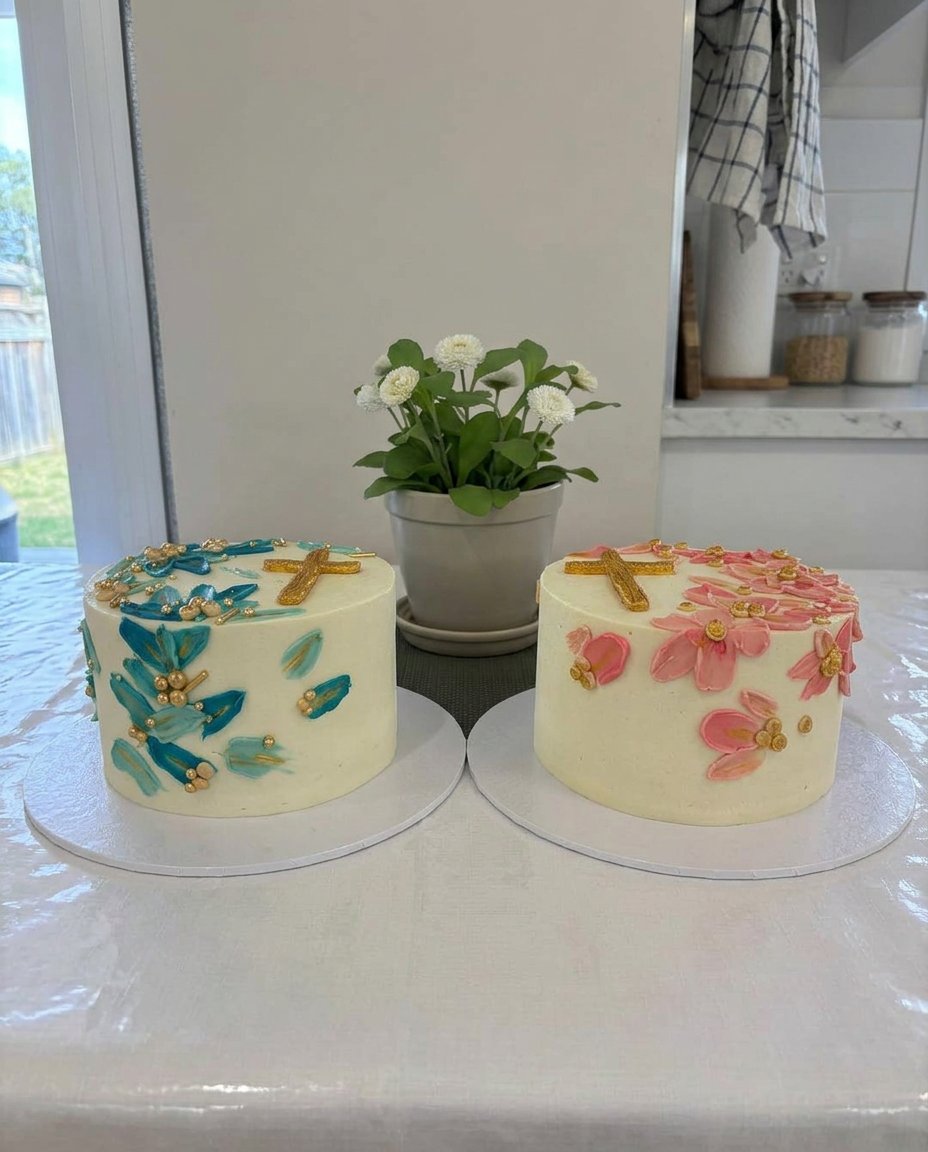 A white baptism cake with piped stars on an antique lace tablecloth
