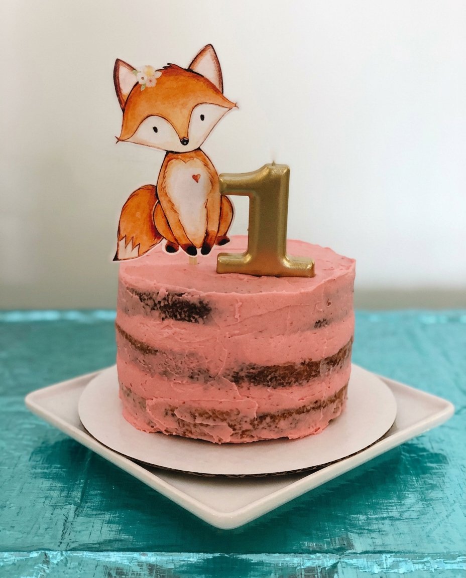 A hand whisking eggs and sugar in a large metal bowl until pale and thick