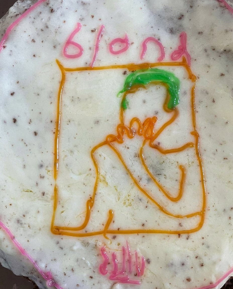 A stunning Frank Ocean themed cake featuring a realistic gummy ocean and modeling chocolate palm trees