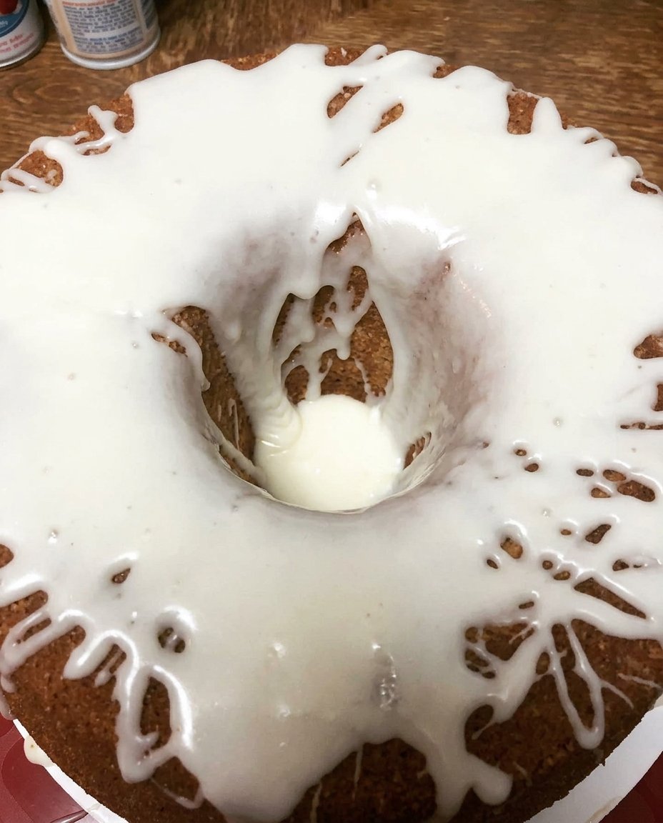 Top down view of ingredients including eggs, oil, lemon pudding, and a bottle of 7 Up.