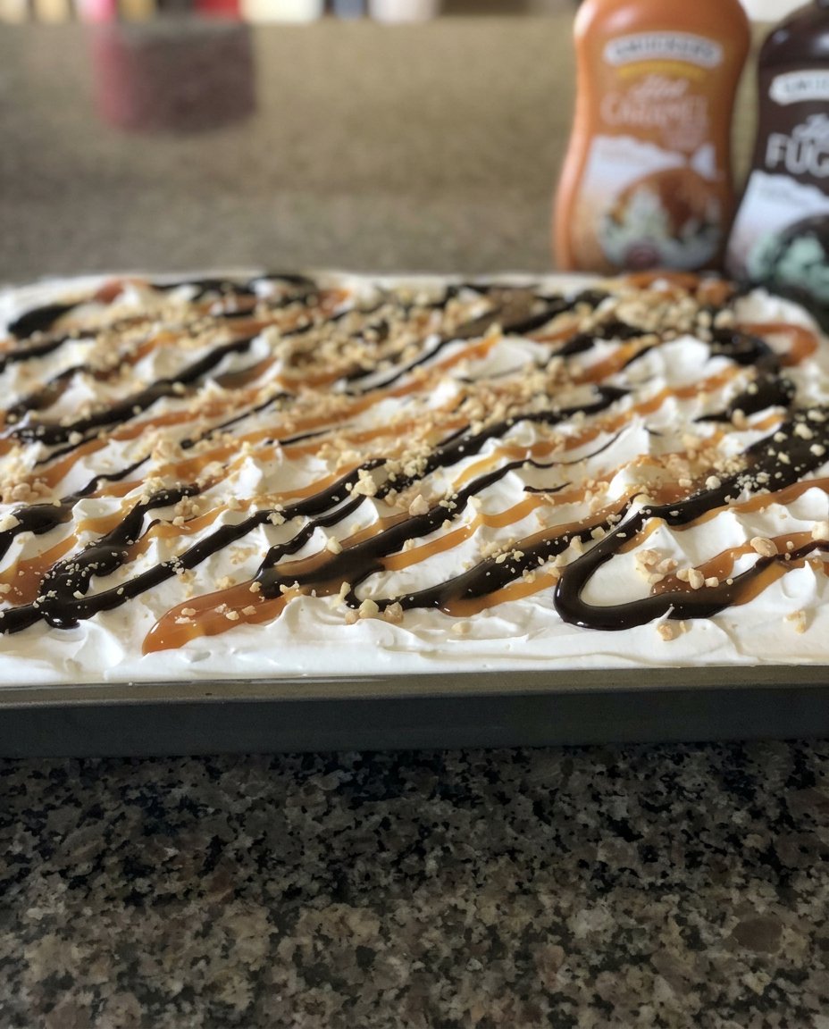 A close up shot of a slice being taken from the ice cream cake