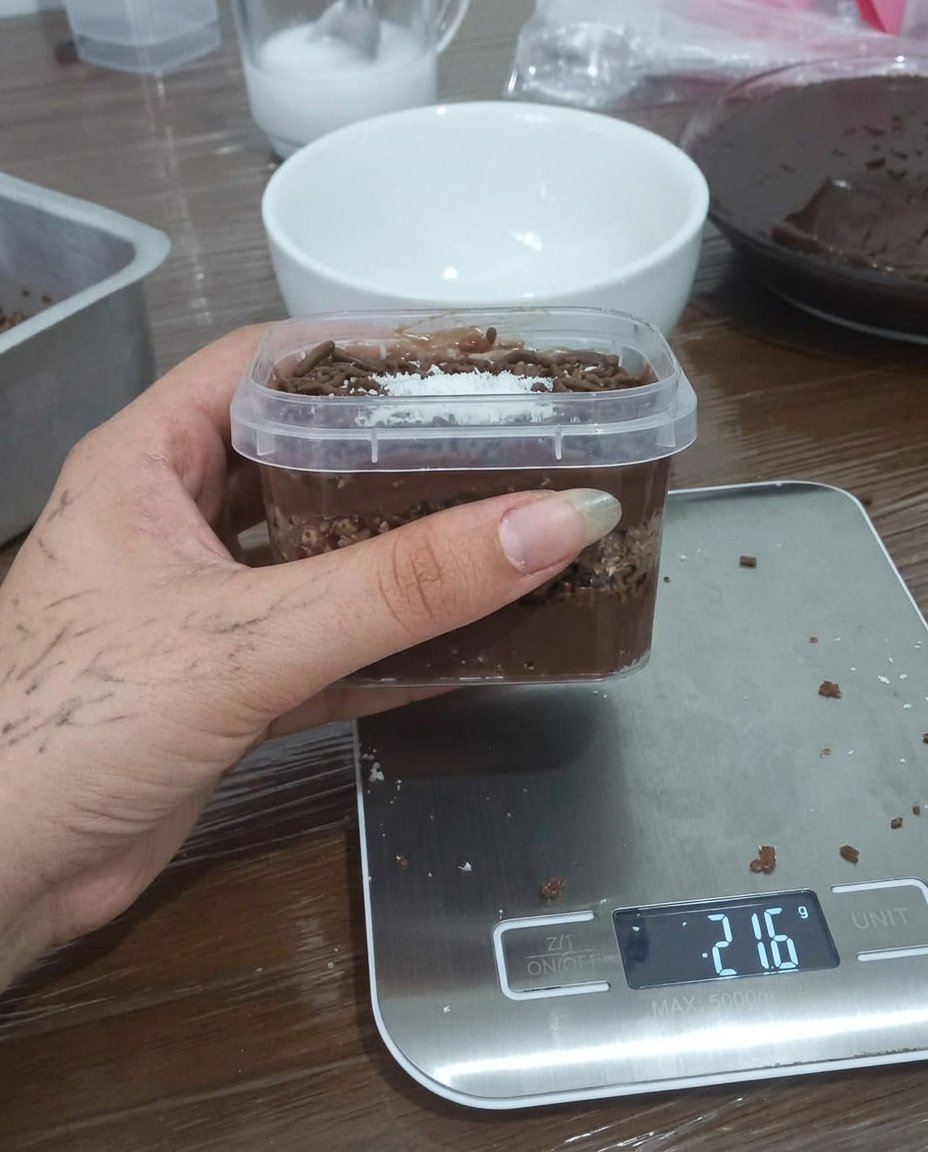 Pale yellow creamed butter and sugar in a mixing bowl