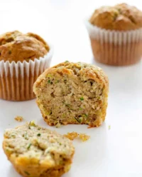 Freshly baked banana zucchini muffins in a tin