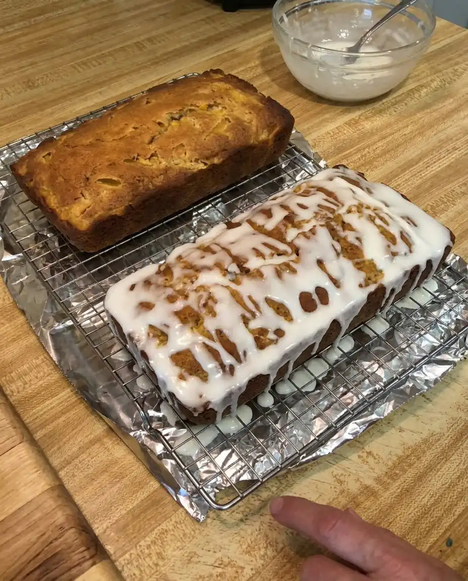 Folding peaches into the thick batter for heavenly peach bread