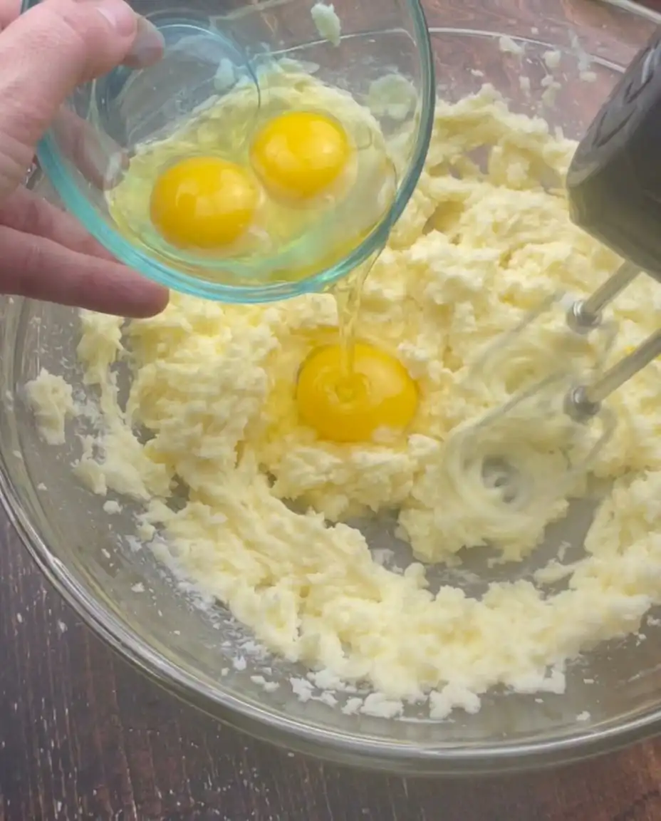 A collection of high quality ingredients including Swan cake flour, amaretto, and fresh cherries
