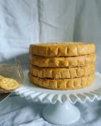 A close up slice of Ritz Cracker Salted Caramel Icebox Cake showing layers of crackers and caramel.