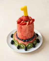 Baby's First Watermelon Yogurt Cake served on a high chair tray
