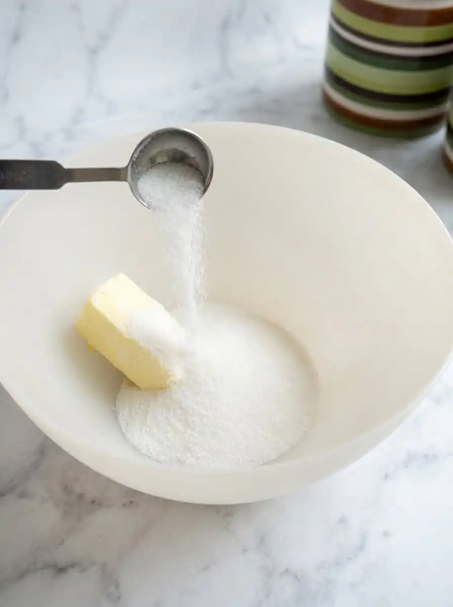 Creamed butter and sugar in a mixing bowl for Blueberry Buttermilk Breakfast Cake.
