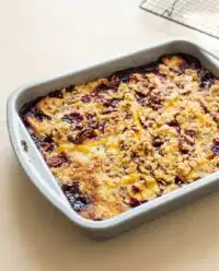 Sweetened blackberries and peaches assembled for a classic Blackberry Peach Dump Cake