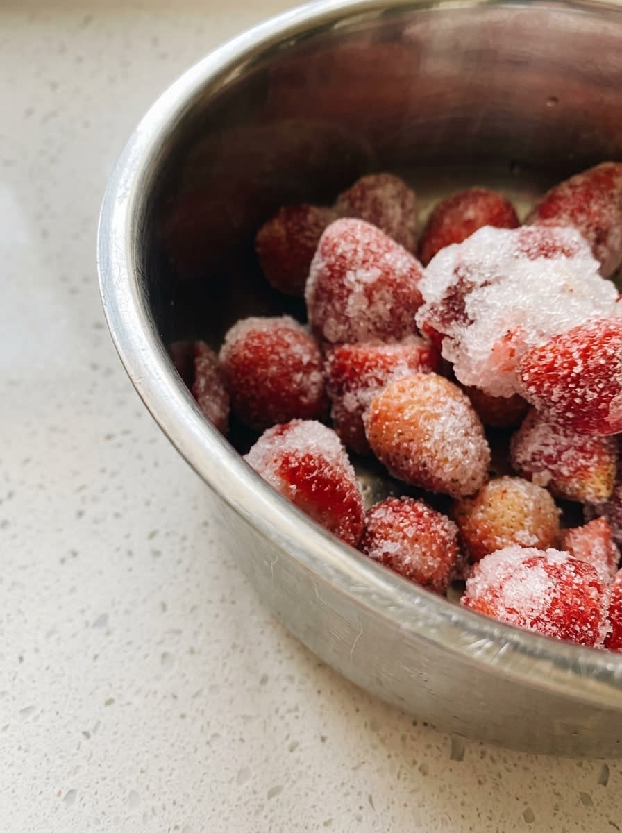 Strawberry Topped Funnel Cake 15 Frying the golden lattice of a Strawberry Topped Funnel Cake in hot oil