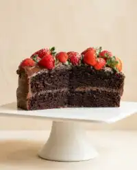 A stunning double-layer Hershey's Perfectly Chocolate Cake frosted with glossy fudge icing.