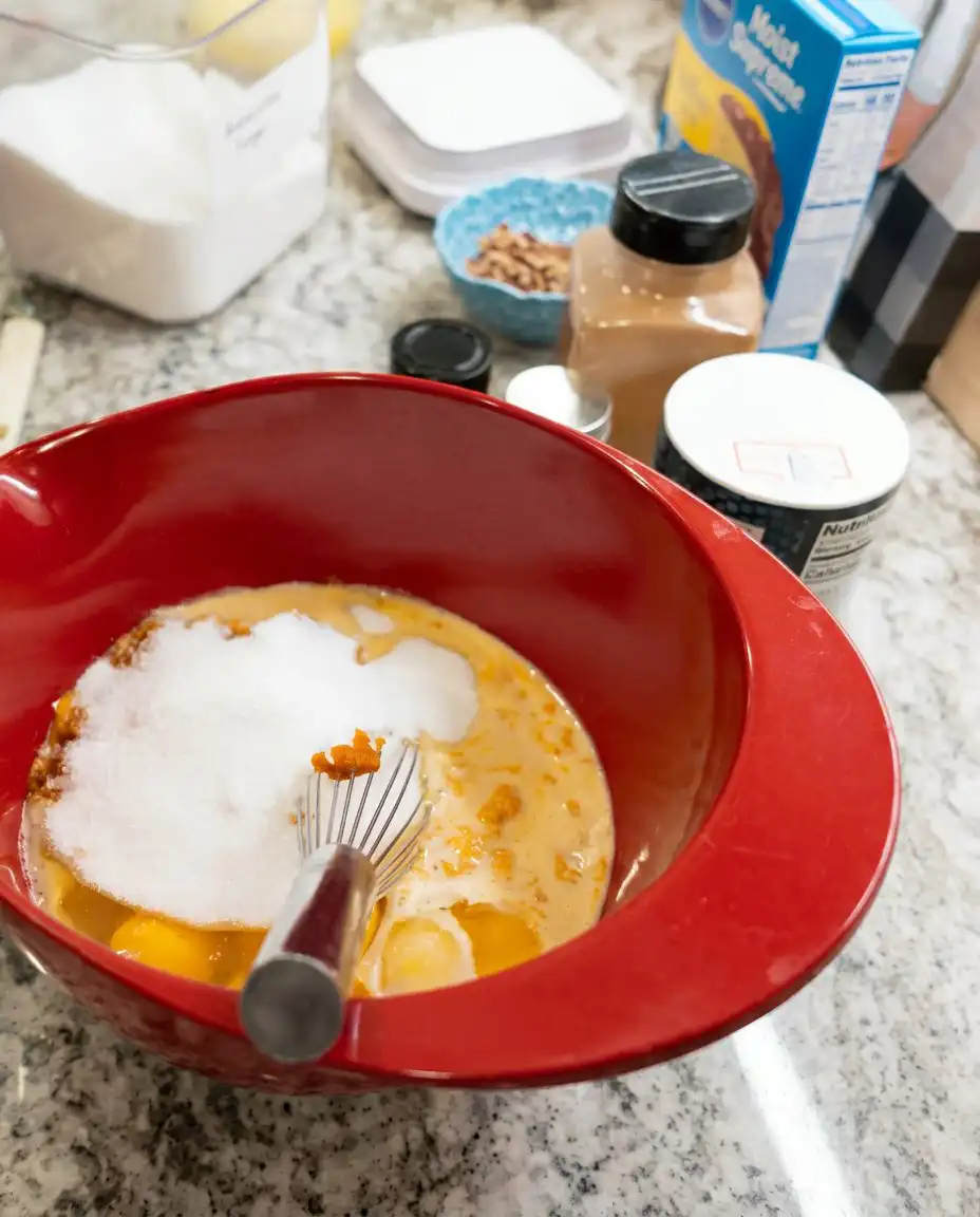 A beautifully arranged mise en place showing the ingredients for Classic Pumpkin Crunch Cake.